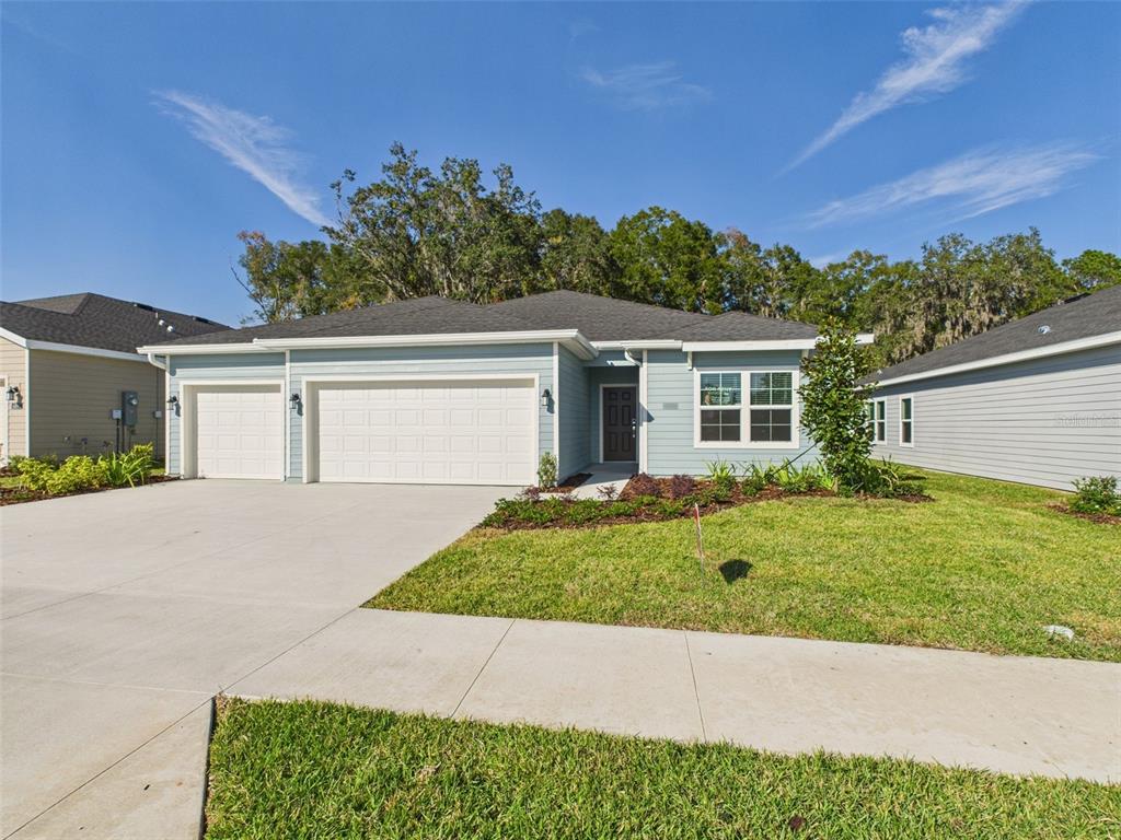 front view of a house with a yard