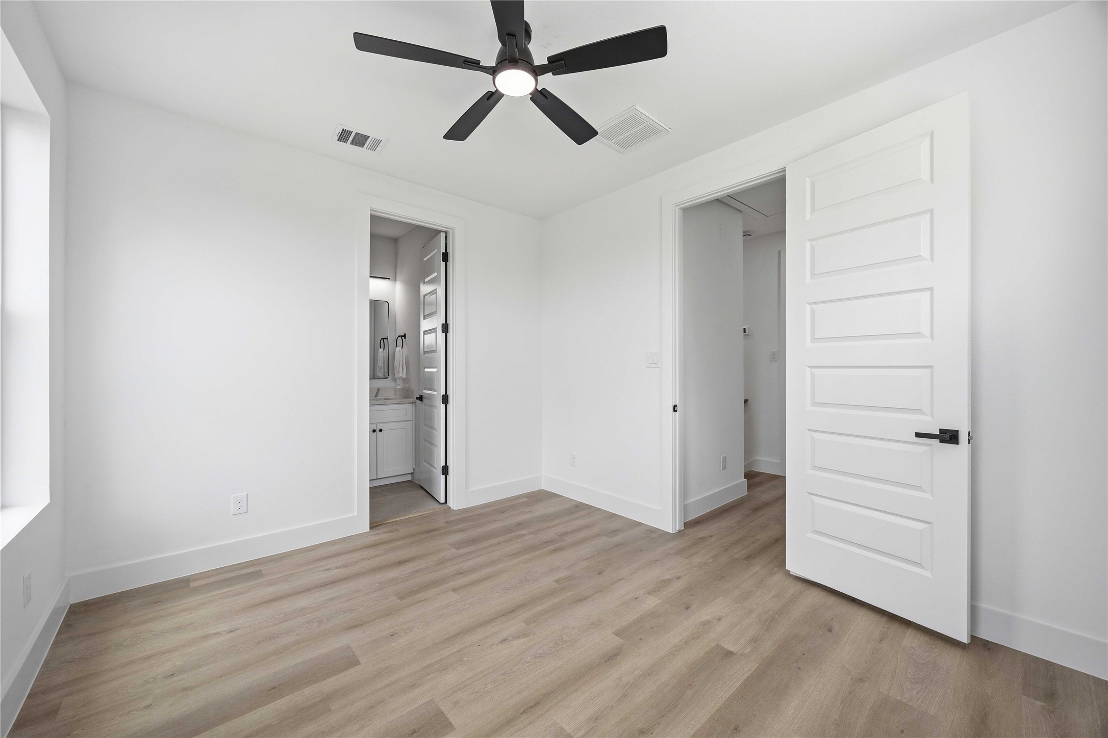3103 Lelia Street, Unit A Houston, TX 77026 - Photo 19 of 30 wooden floor in an empty room