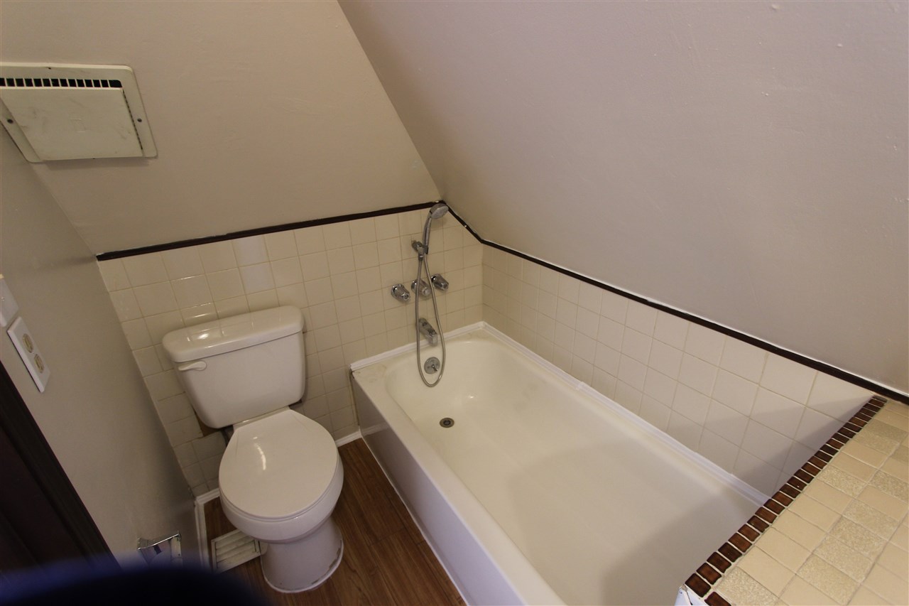 1011 Rood Avenue, Unit C Grand Junction, CO 81501 - Photo 7 of 8 a bathroom with a toilet and a sink