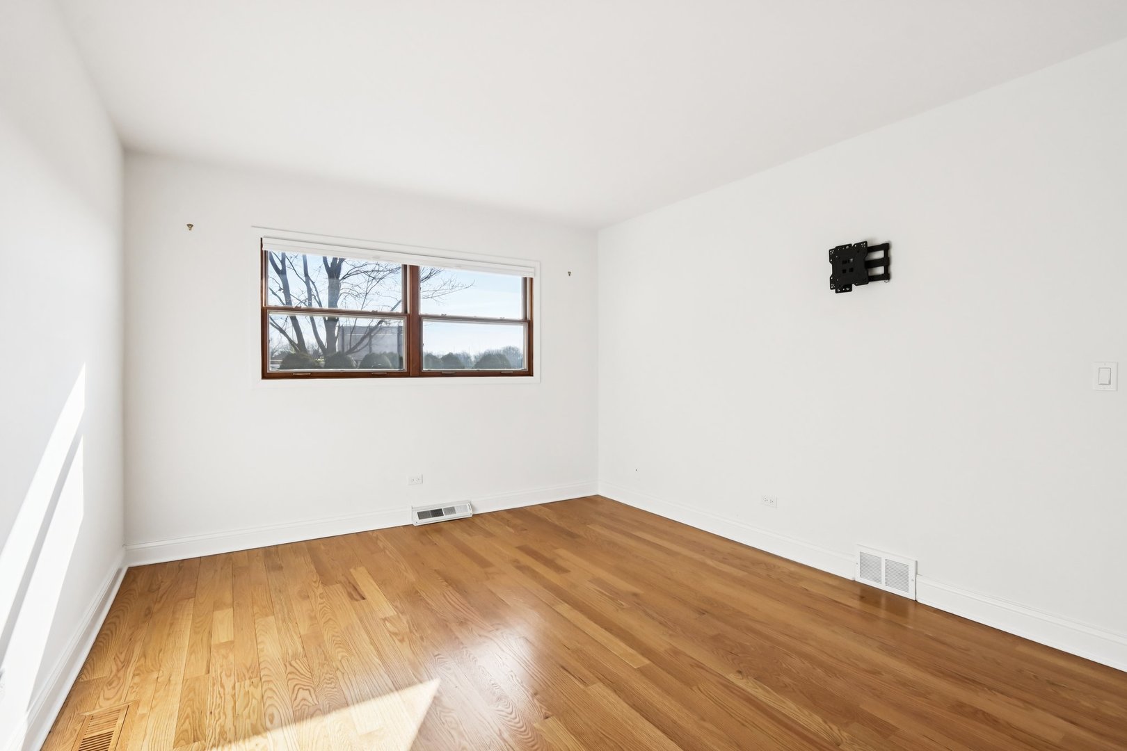 2019 East Avon Lane Arlington Heights, IL 60004 - Photo 26 of 59 a view of empty room with wooden floor