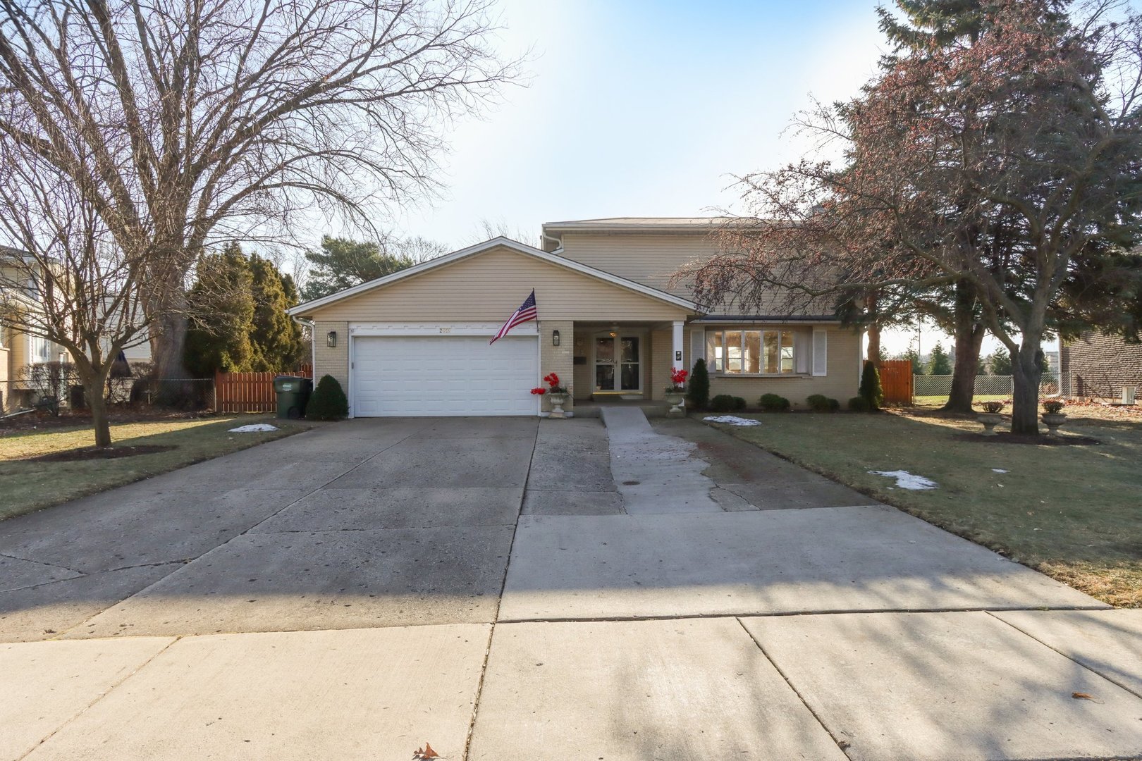 2019 East Avon Lane Arlington Heights, IL 60004 - Photo 3 of 59 a view of house with a yard and large trees