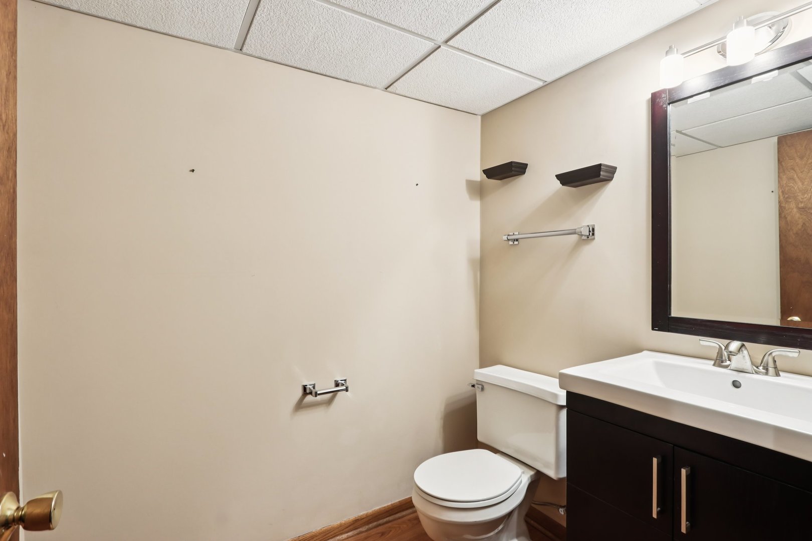 2019 East Avon Lane Arlington Heights, IL 60004 - Photo 44 of 59 a bathroom with a sink a toilet and shower