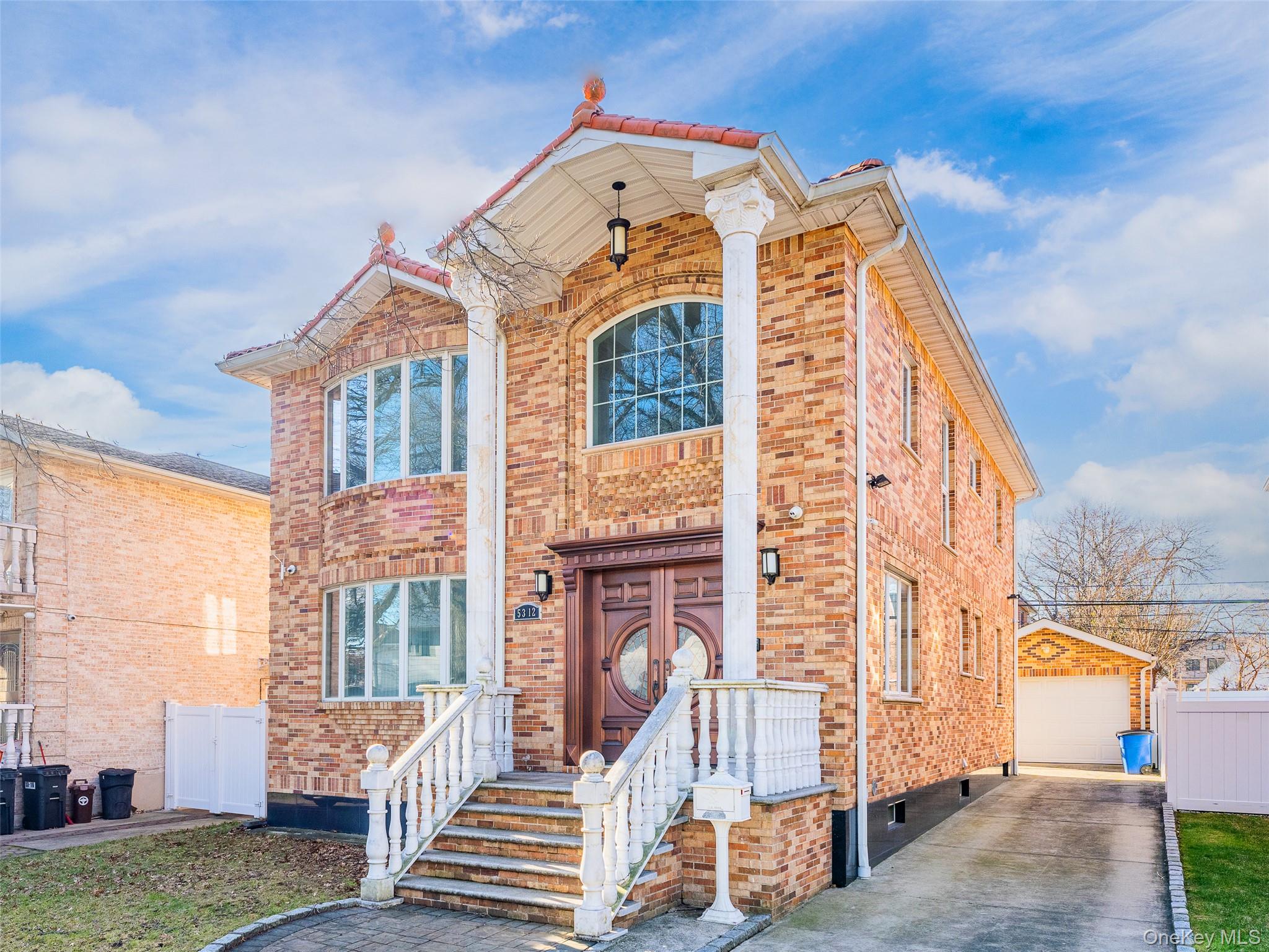 53-12 199th Street Queens, NY 11365 - Photo 1 of 31 a front view of a building