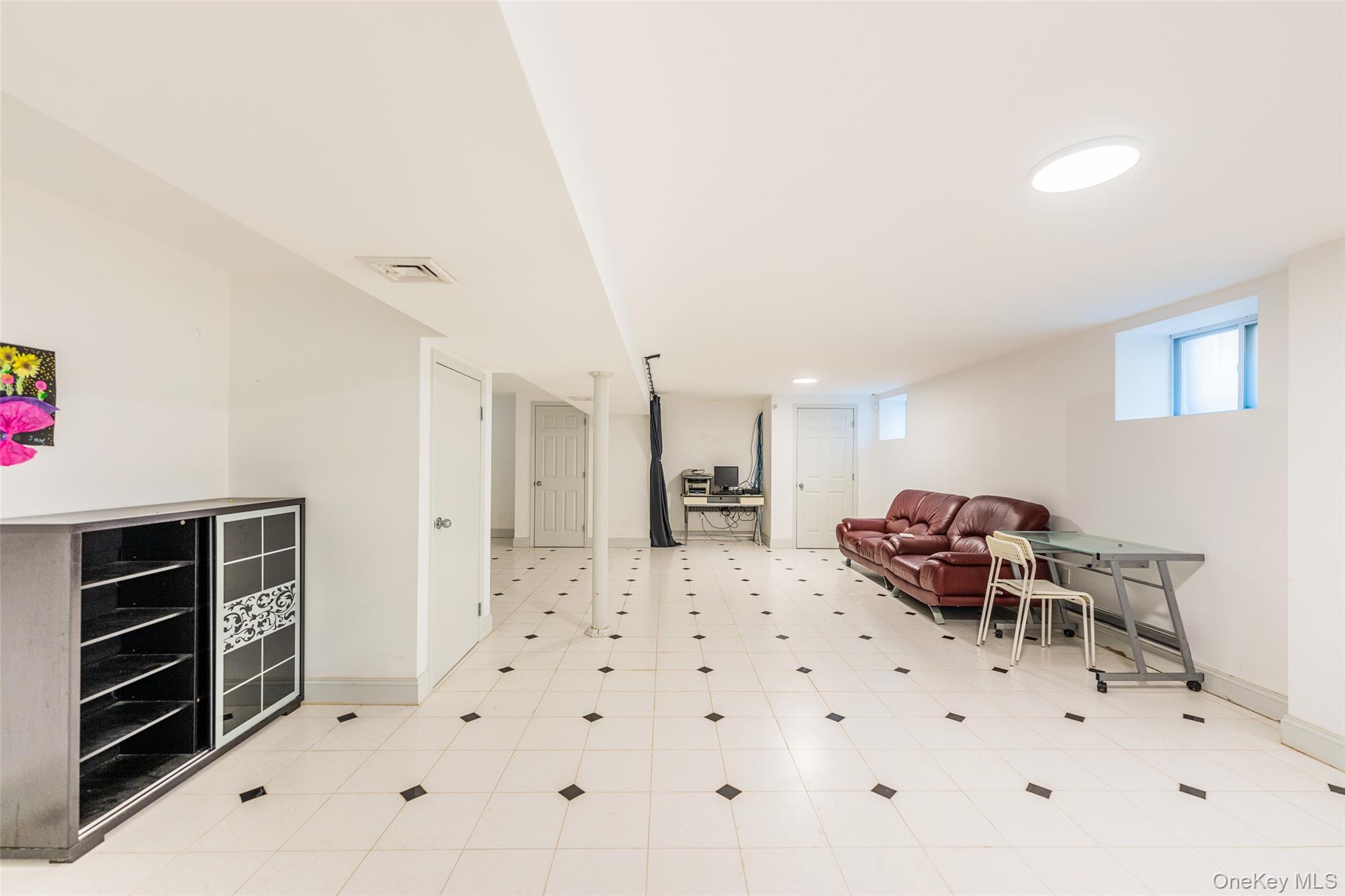 53-12 199th Street Queens, NY 11365 - Photo 21 of 31 a living room with furniture