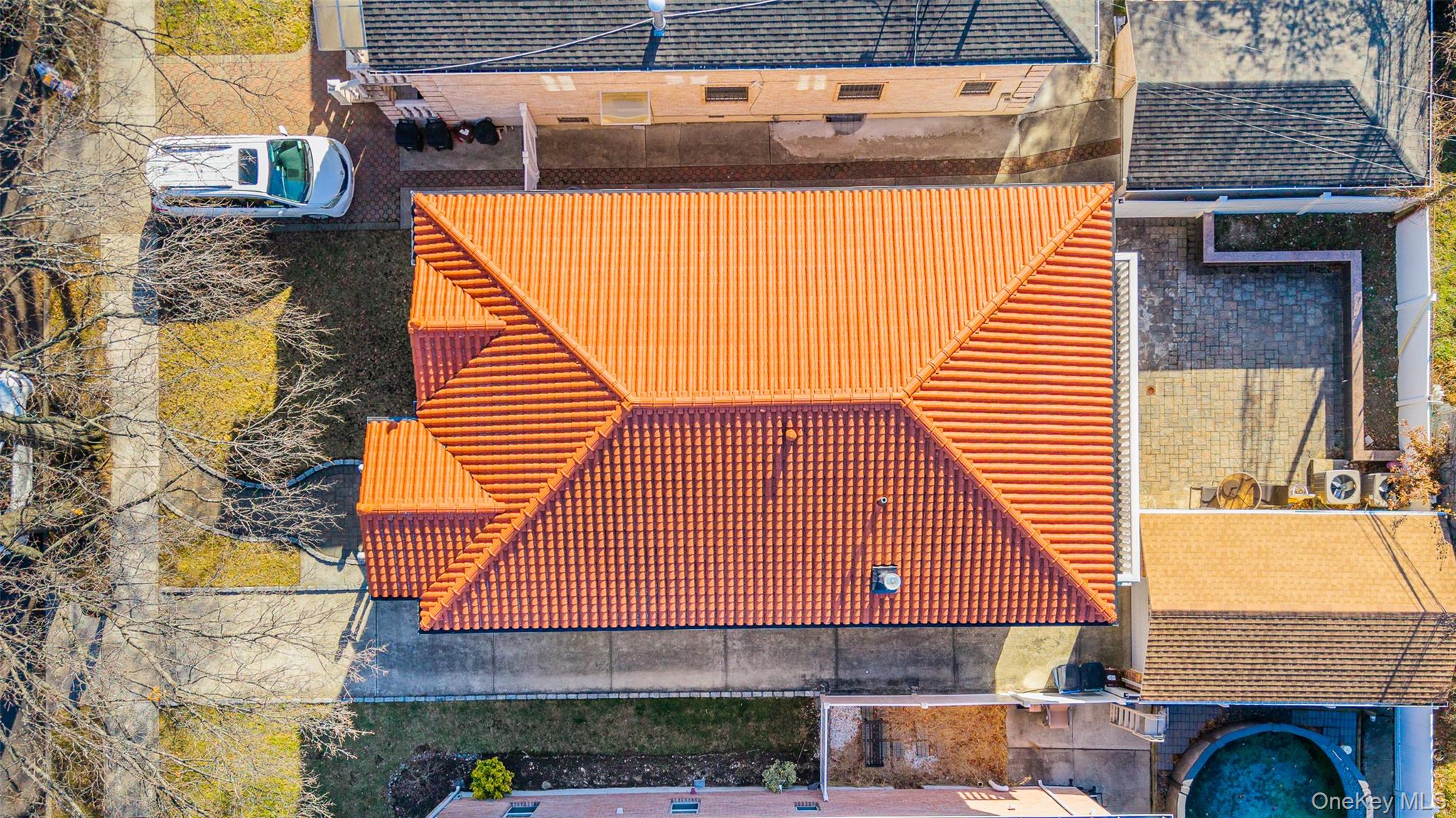 53-12 199th Street Queens, NY 11365 - Photo 30 of 31 a aerial view of a house with a swimming pool