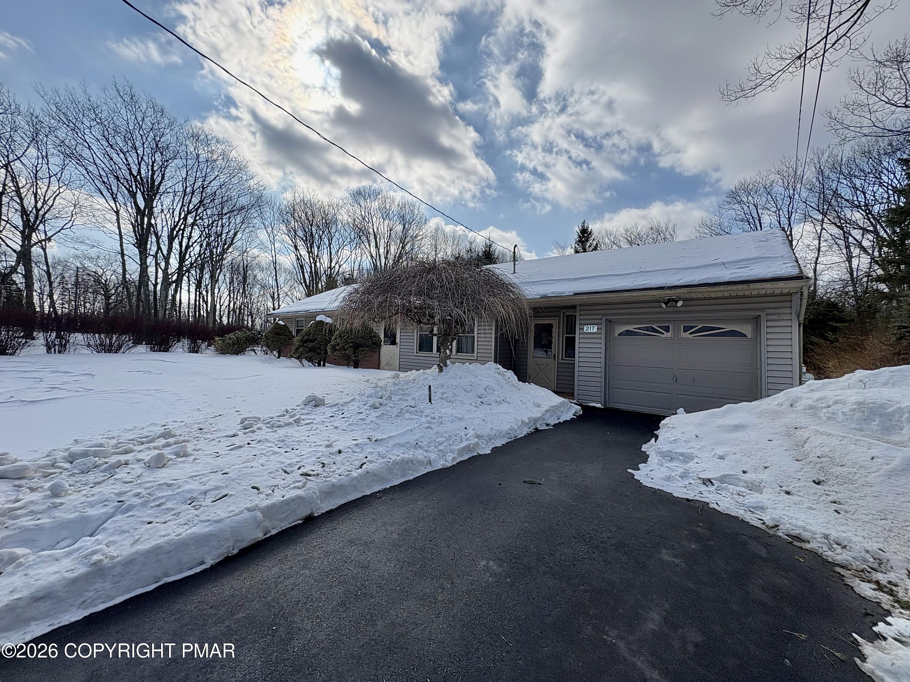 217 Winona Road Mount Pocono, PA 18344 - Photo 1 of 32 FullSizeRender