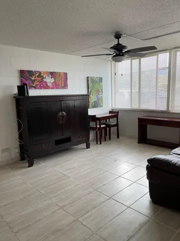 a kitchen with a stove and a refrigerator