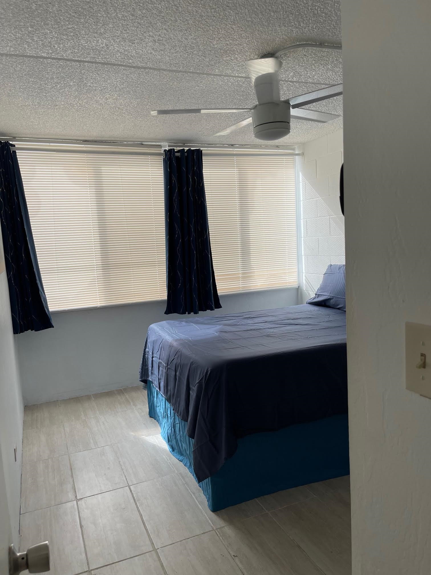 111 Kahului Beach Road, Unit D112 Kahului, HI 96732 - Photo 21 of 29 a view of bedroom with furniture and window