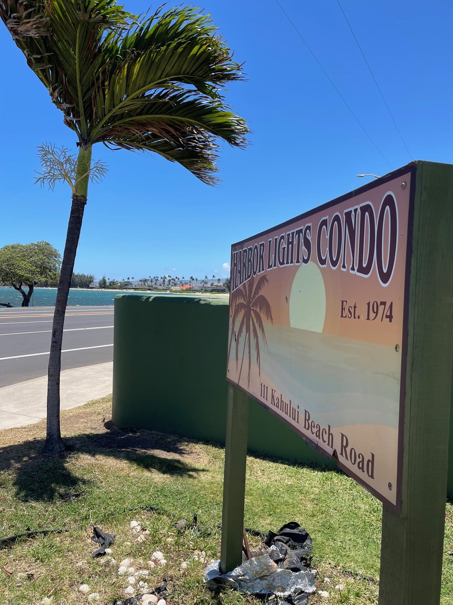 111 Kahului Beach Road, Unit D112 Kahului, HI 96732 - Photo 3 of 29 a sign on the side of the road