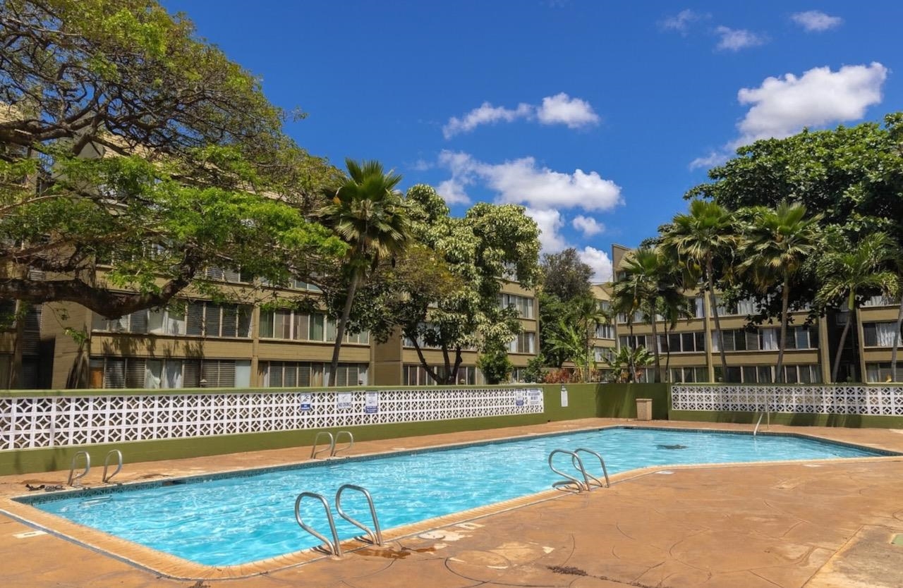 111 Kahului Beach Road, Unit D112 Kahului, HI 96732 - Photo 9 of 29 a view of a swimming pool with an outdoor space and seating area