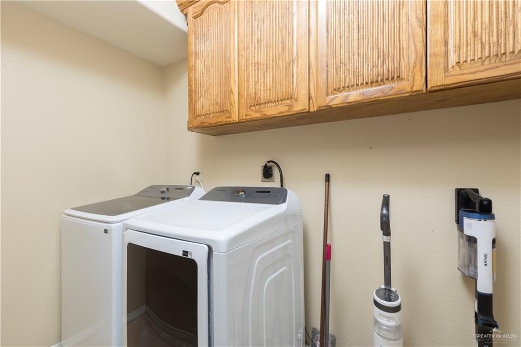 616 Gable Drive Pharr, TX 78577 - Photo 16 of 22 a utility room with dryer and washer