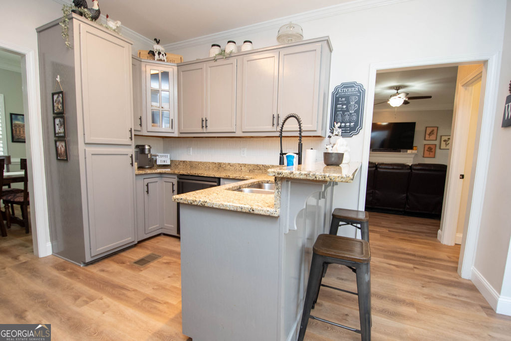 100 Spring Forest Trail Sharpsburg, GA 30277 - Photo 11 of 39 a kitchen with a sink appliances and cabinets