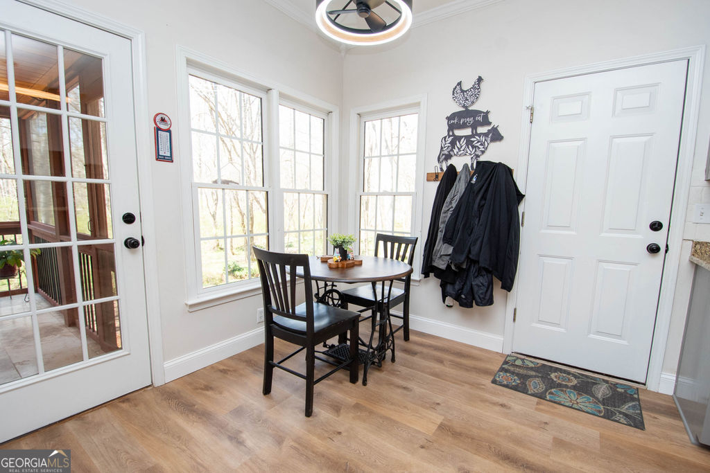 100 Spring Forest Trail Sharpsburg, GA 30277 - Photo 12 of 39 a dining room with furniture and window