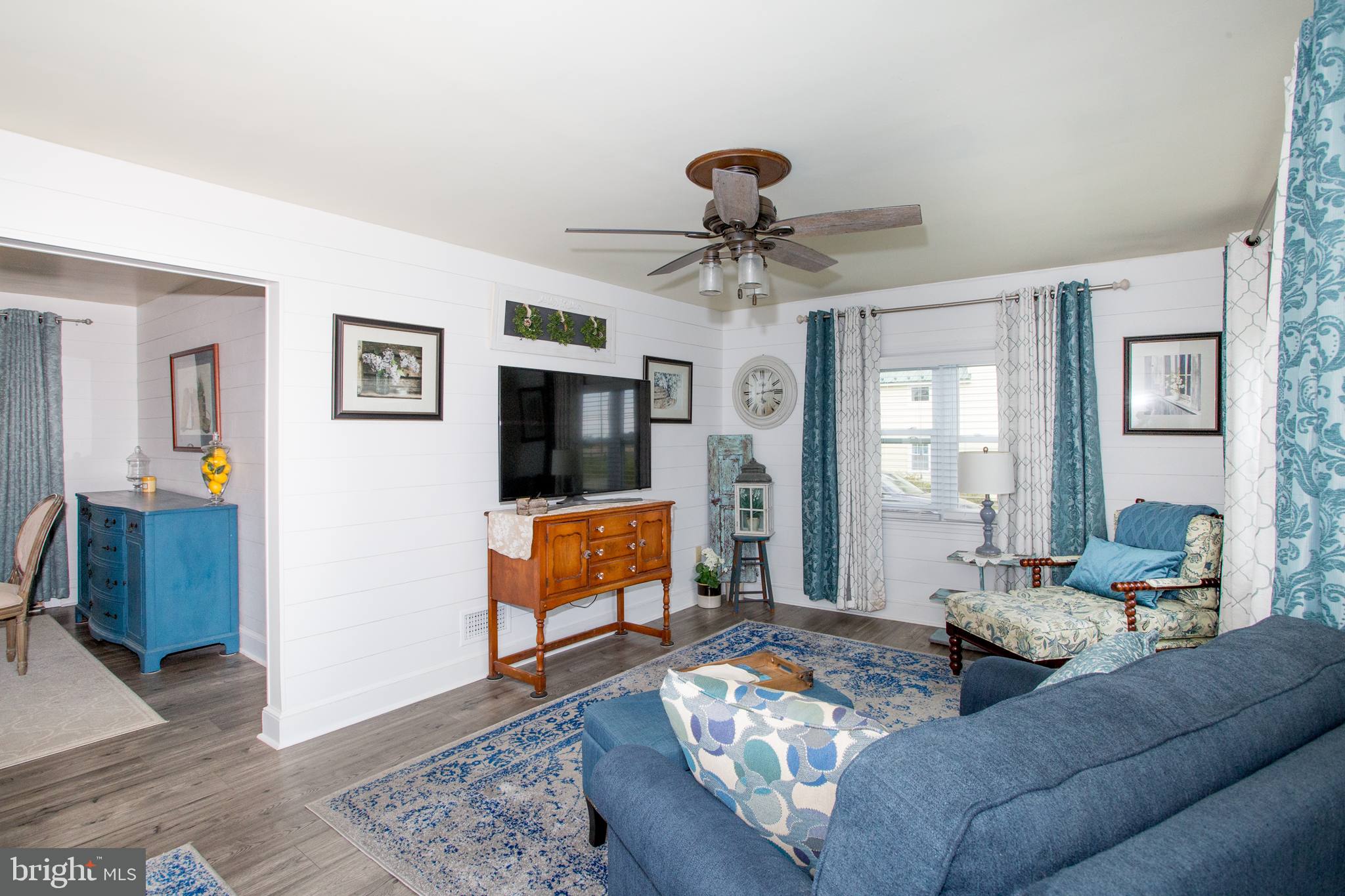 5885 Telegraph Road Elkton, MD 21921 - Photo 11 of 27 a living room with furniture and a flat screen tv