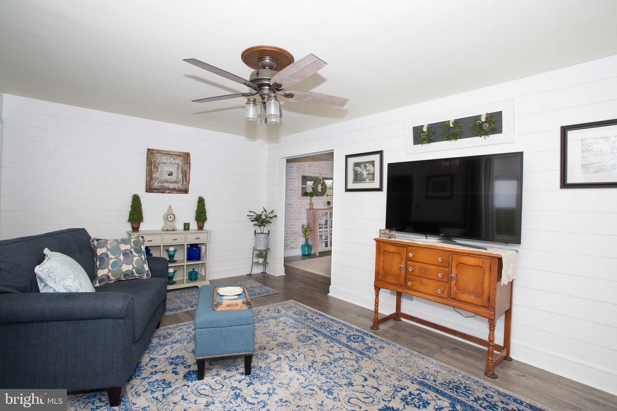 5885 Telegraph Road Elkton, MD 21921 - Photo 12 of 27 a living room with furniture and a flat screen tv
