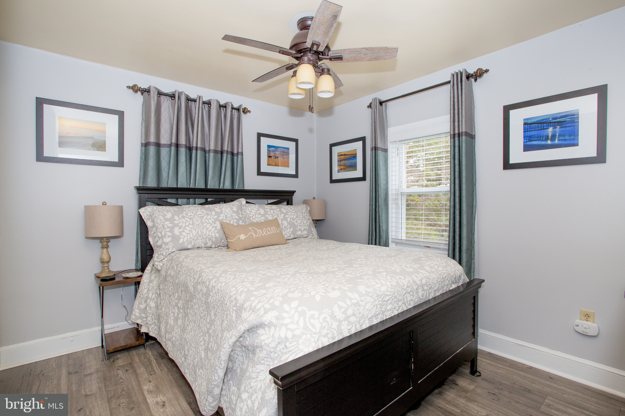 5885 Telegraph Road Elkton, MD 21921 - Photo 19 of 27 a bedroom with bed and a chandelier