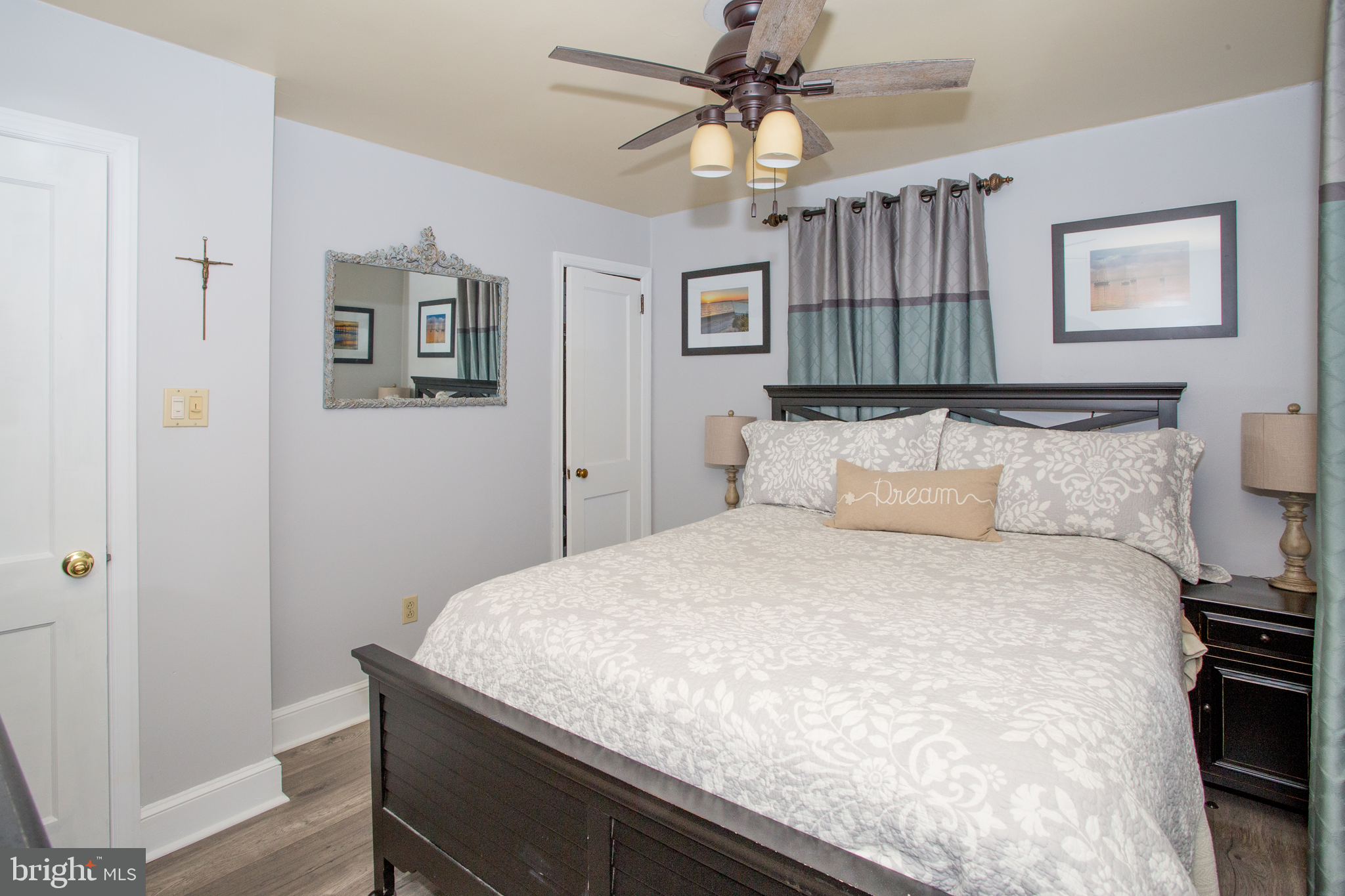 5885 Telegraph Road Elkton, MD 21921 - Photo 20 of 27 a bedroom with a bed and a chandelier