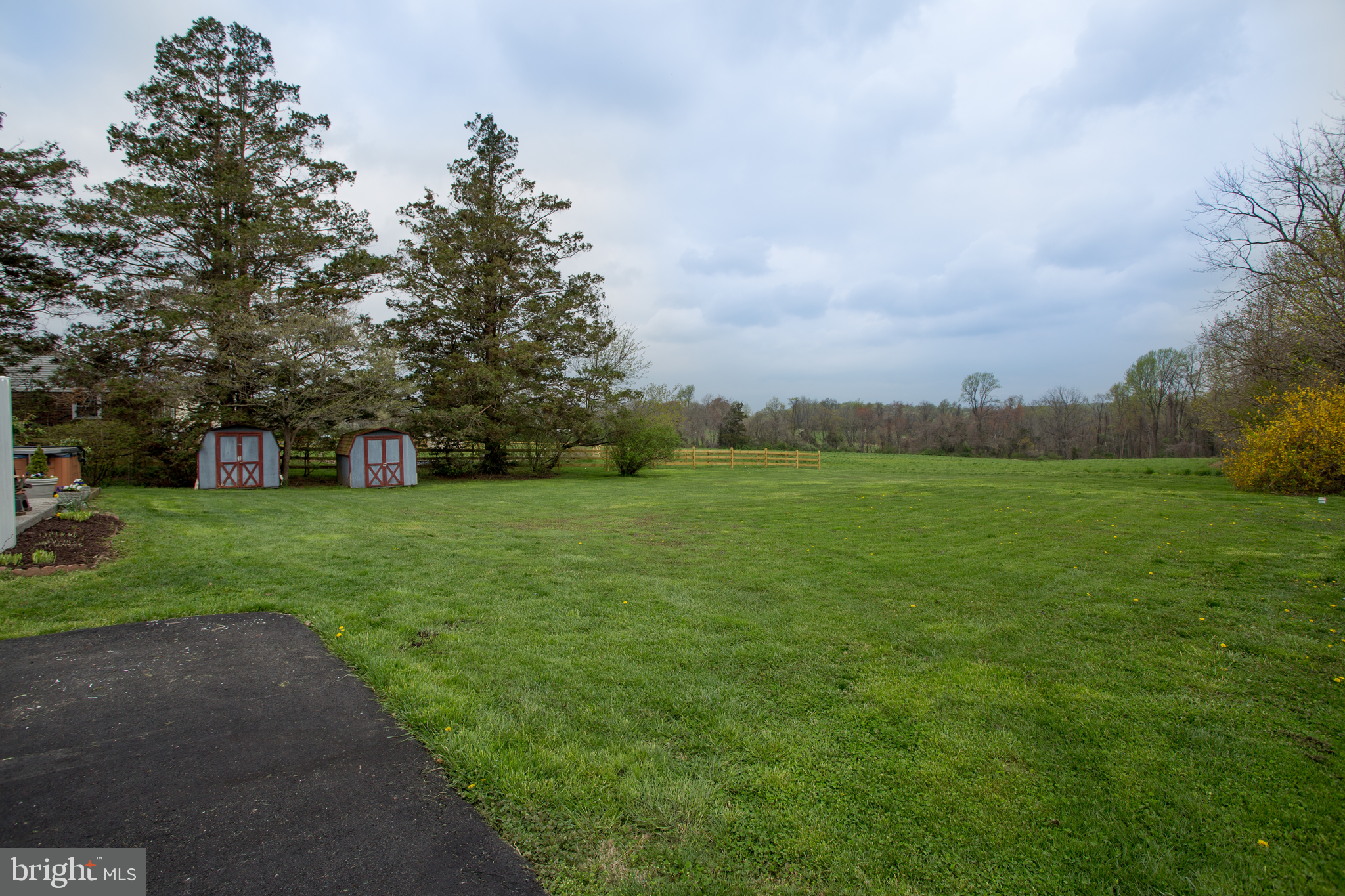 5885 Telegraph Road Elkton, MD 21921 - Photo 4 of 27 a view of a garden with a building in the background
