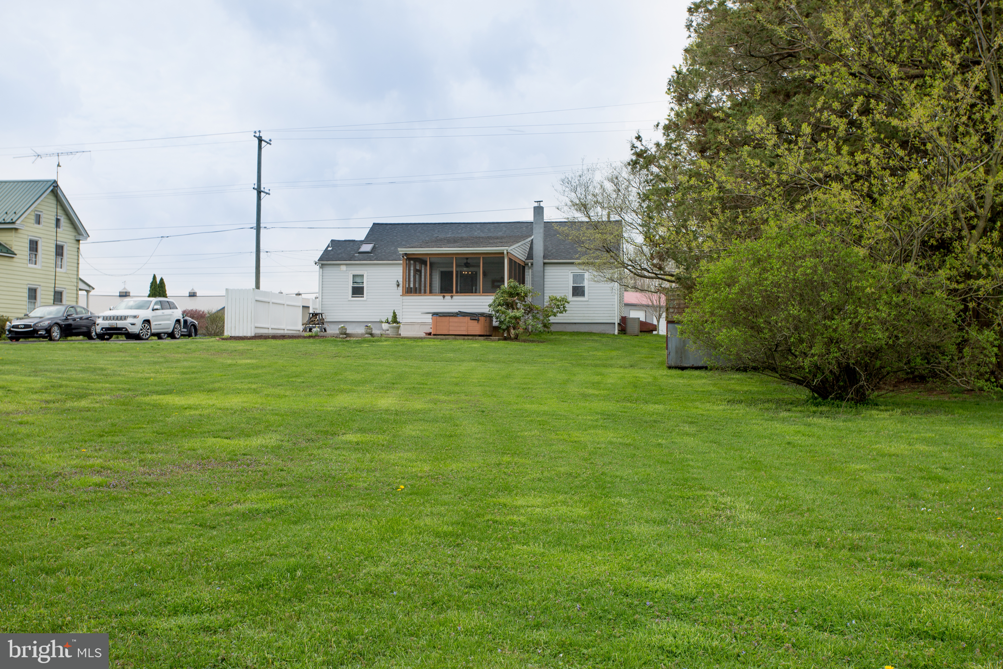 5885 Telegraph Road Elkton, MD 21921 - Photo 5 of 27 a view of a house with a big yard and large trees