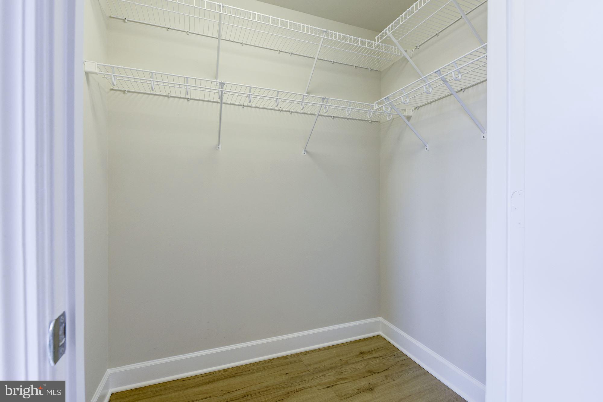 401 13th Street Northeast, Unit PH8 Washington, DC 20002 - Photo 19 of 27 a view of a room with wooden floor