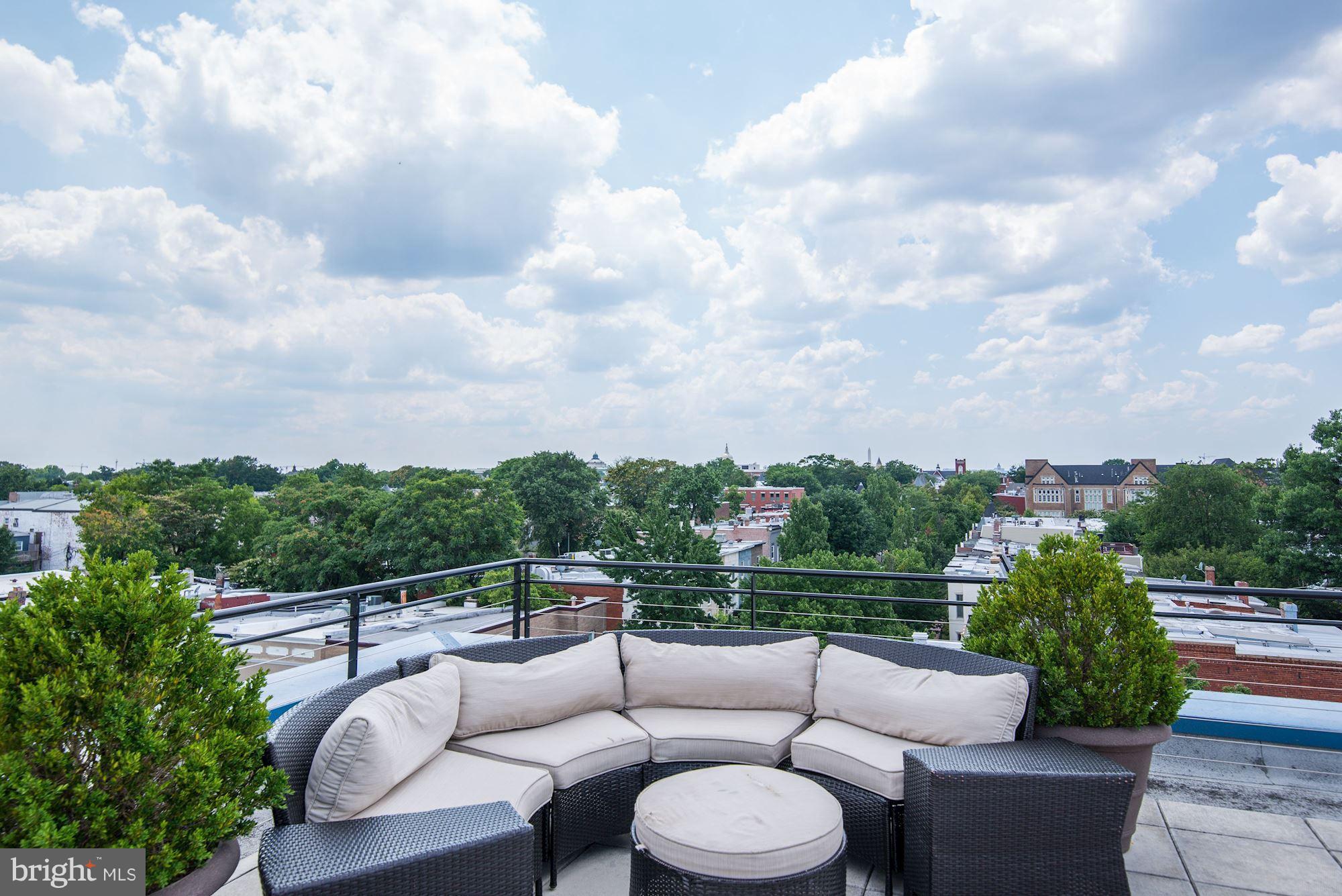 401 13th Street Northeast, Unit PH8 Washington, DC 20002 - Photo 21 of 27 a view of a patio