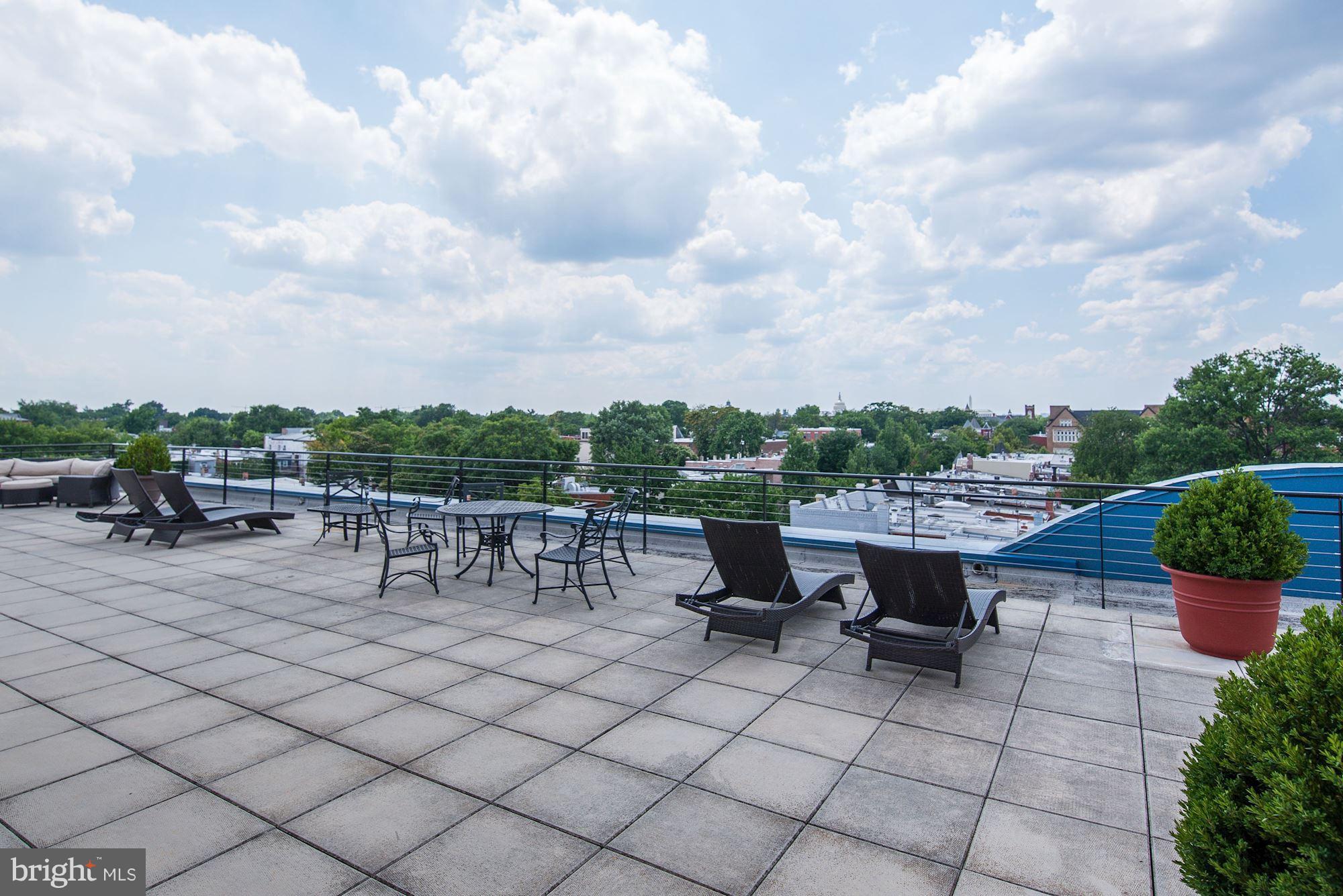 401 13th Street Northeast, Unit PH8 Washington, DC 20002 - Photo 22 of 27 a view of a terrace with furniture