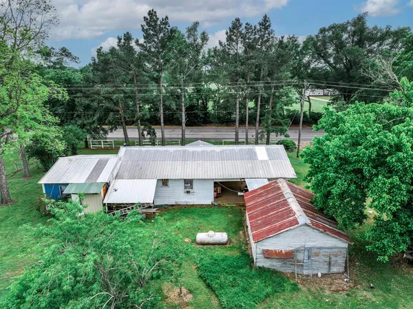 a view of yard with furniture