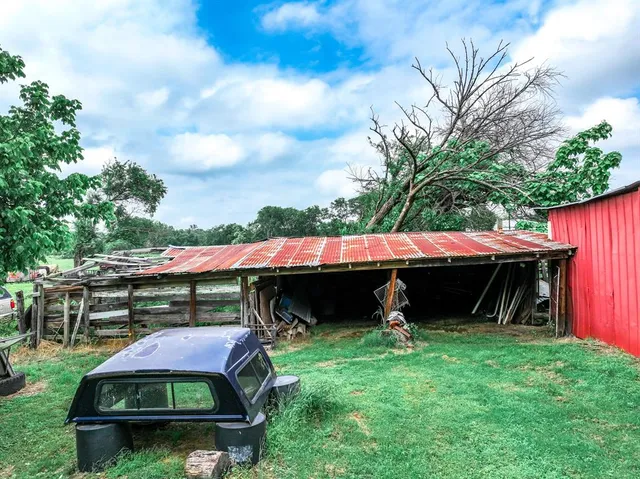 a backyard of a house with lots of green space