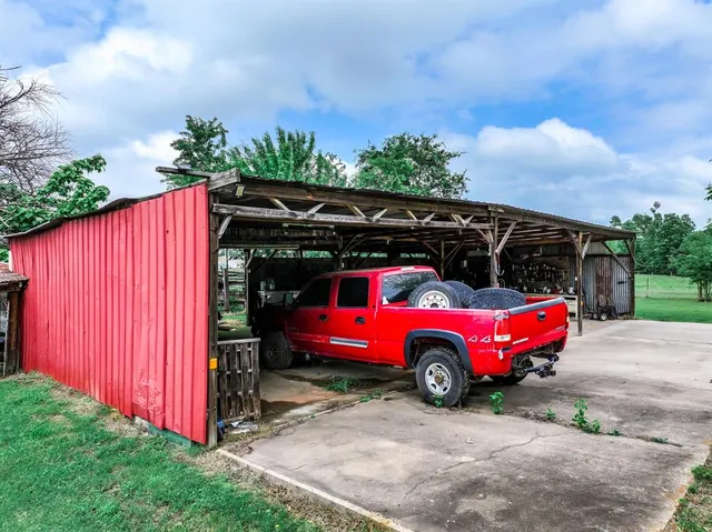 a view of backyard with green space