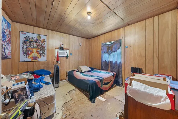 a kitchen view with table and chairs