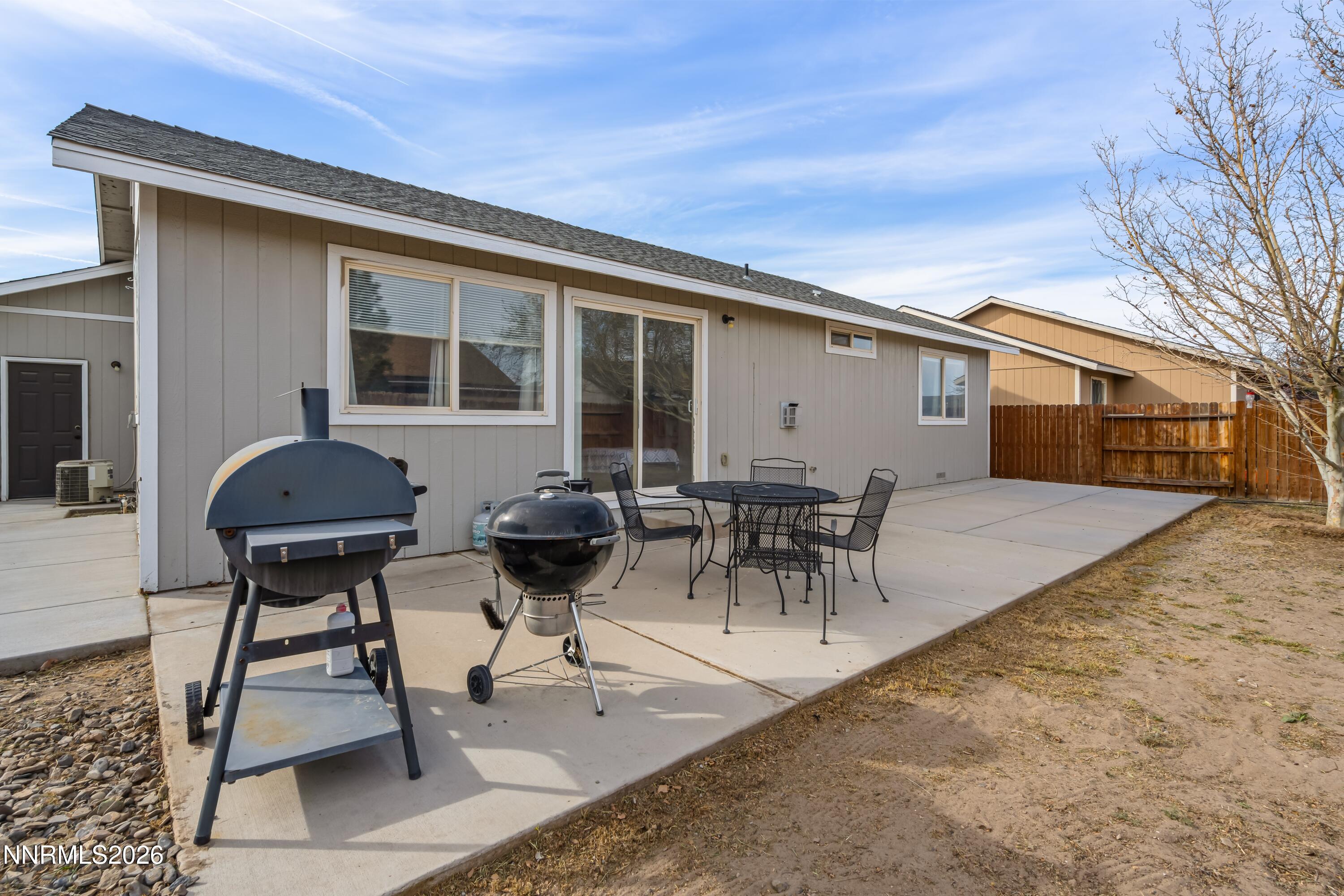 712 Hastings Way Fernley, NV 89408 - Photo 21 of 36 a view of house with patio outdoor seating