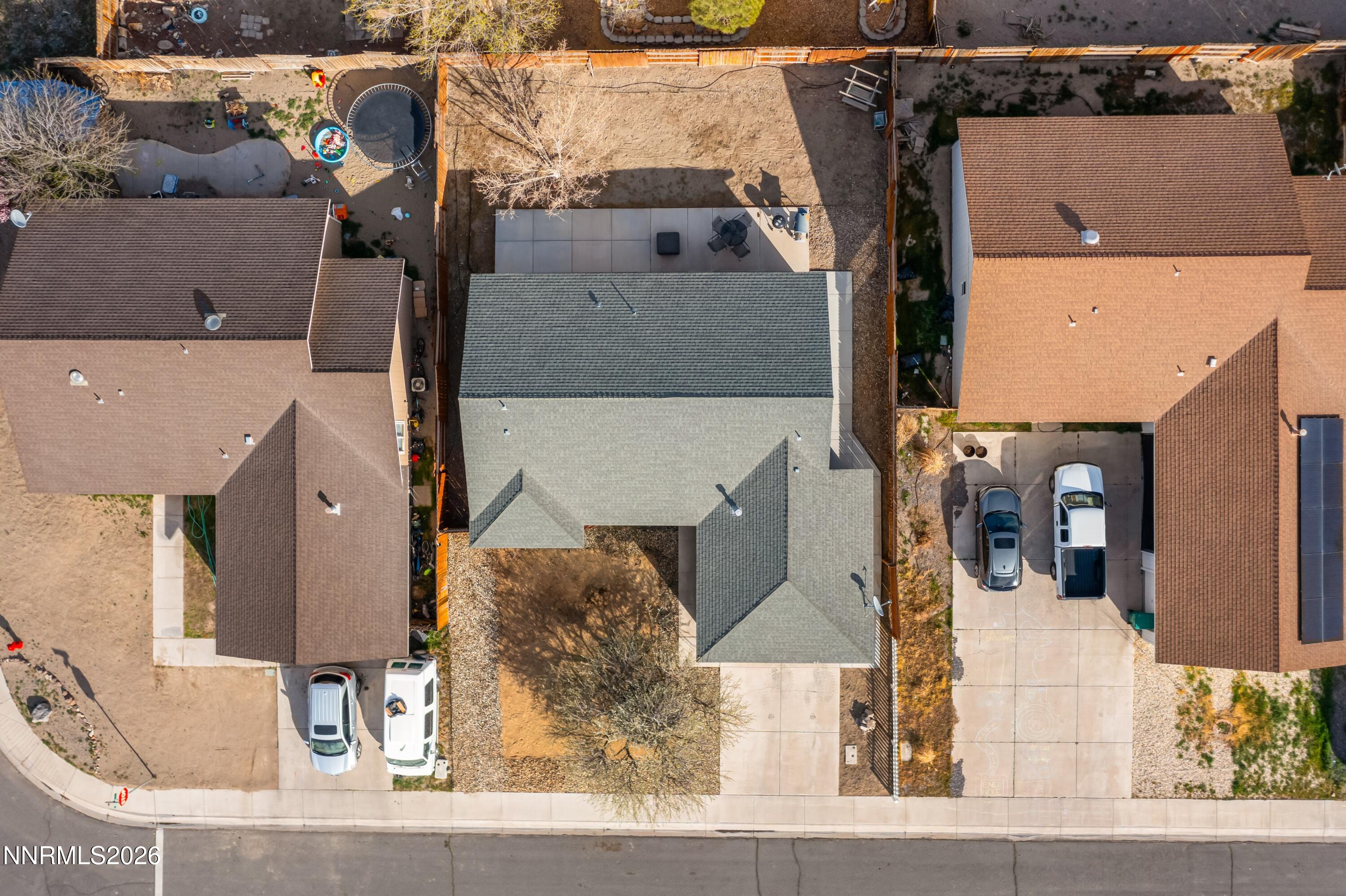 712 Hastings Way Fernley, NV 89408 - Photo 26 of 36 an aerial view of residential houses with outdoor space