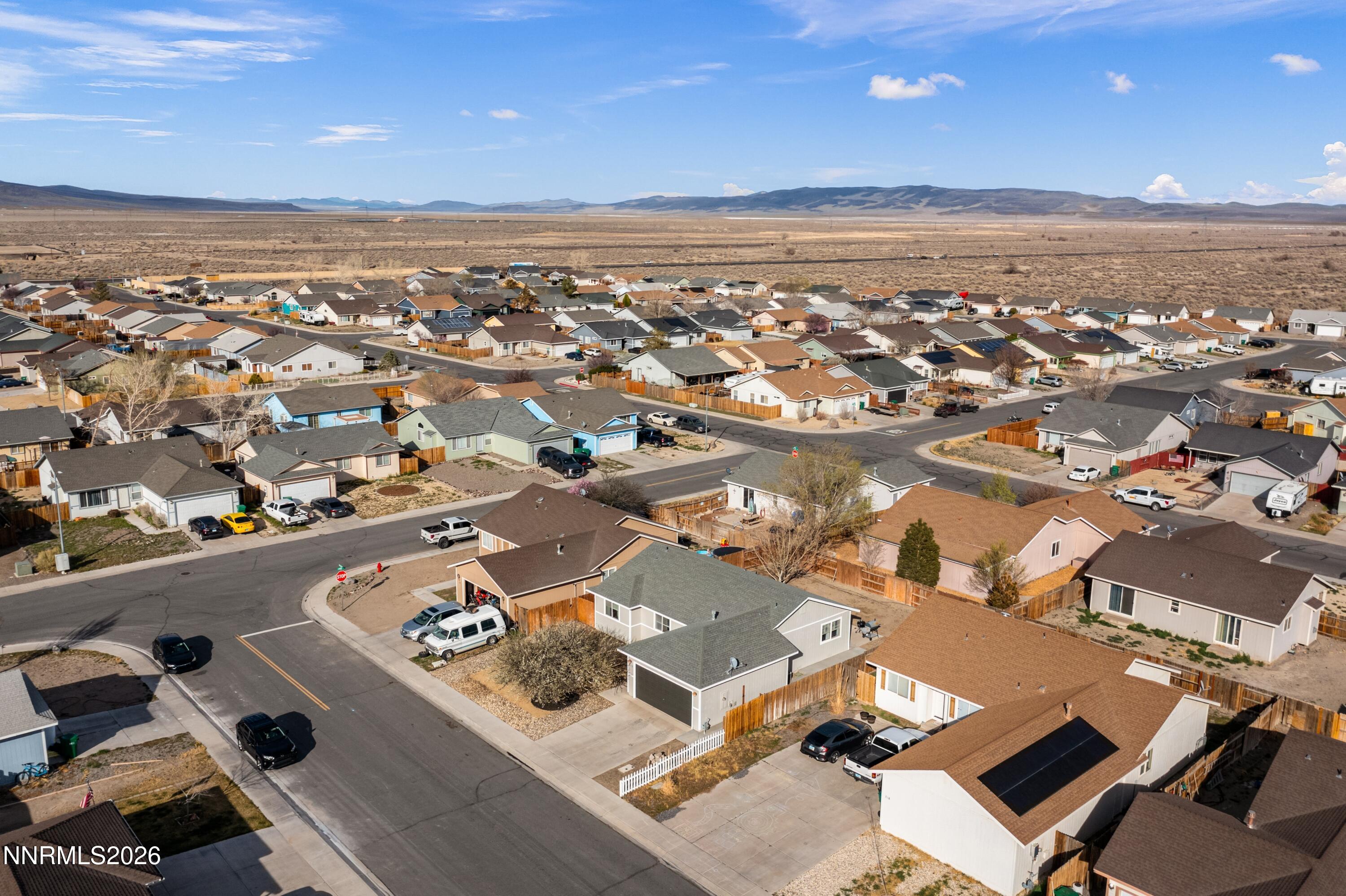 712 Hastings Way Fernley, NV 89408 - Photo 3 of 36 an aerial view of residential building with parking