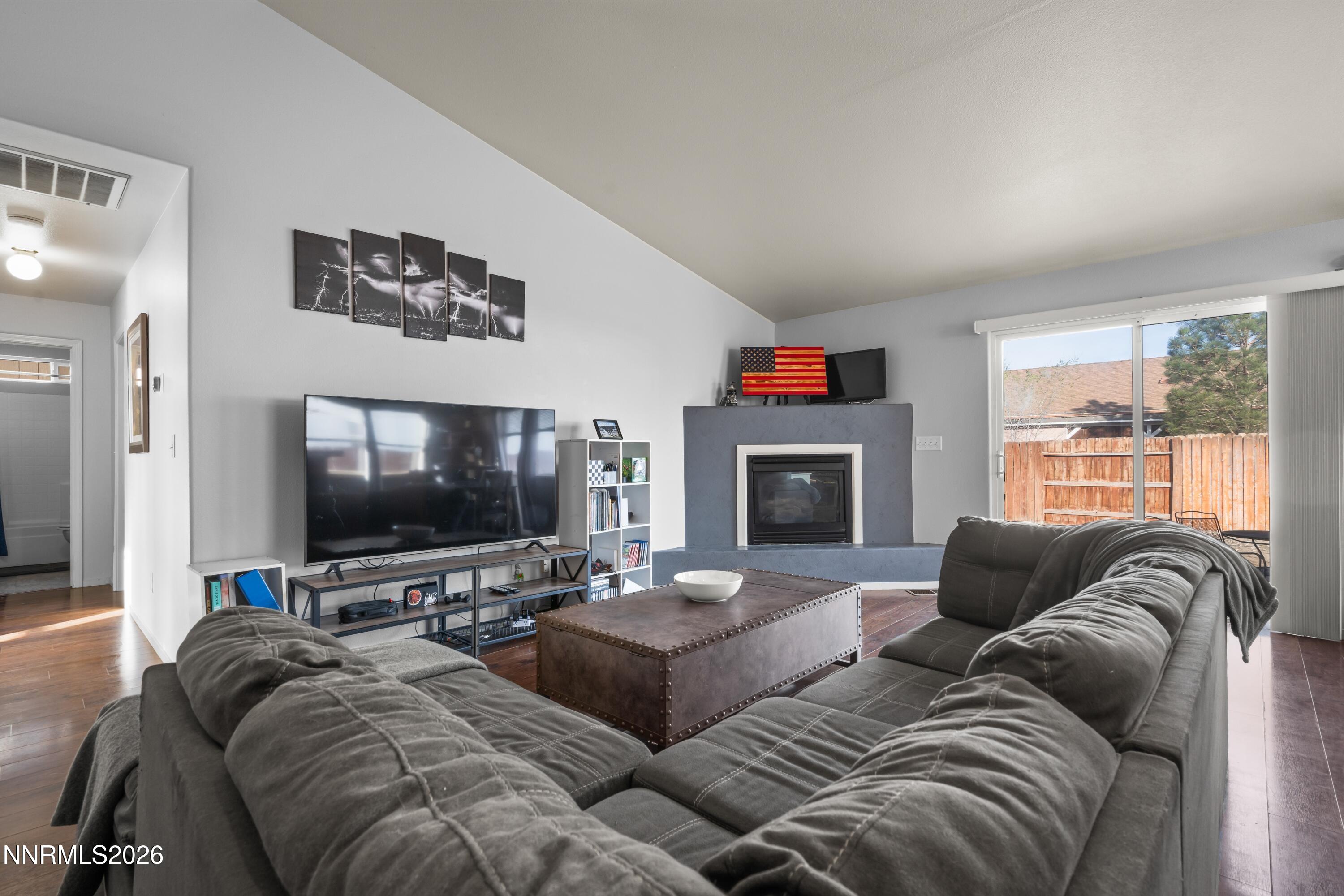 712 Hastings Way Fernley, NV 89408 - Photo 6 of 36 a living room with furniture and a flat screen tv