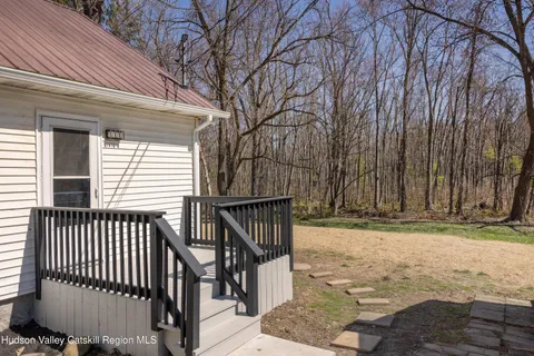 a view of house with yard