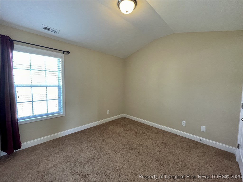 608 Stonebriar Avenue Raeford, NC 28376 - Photo 12 of 29 an empty room with a window