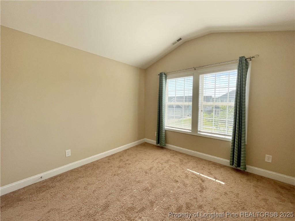 608 Stonebriar Avenue Raeford, NC 28376 - Photo 16 of 29 a view of an empty room with a window