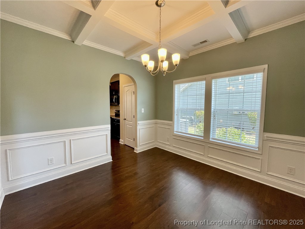 608 Stonebriar Avenue Raeford, NC 28376 - Photo 25 of 29 a view of a room with wooden floor chandelier and windows