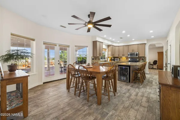 a kitchen with granite countertop a sink and a window