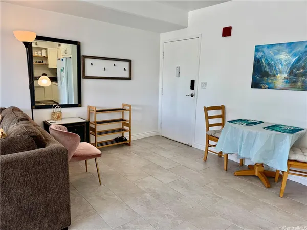 a living room with furniture and a couch