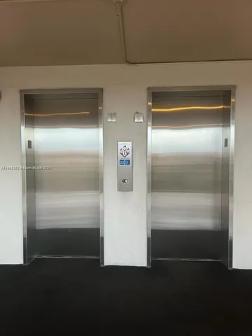 a view of a lake with a building in the background