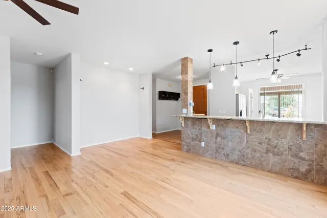 a view of a kitchen with furniture and a window