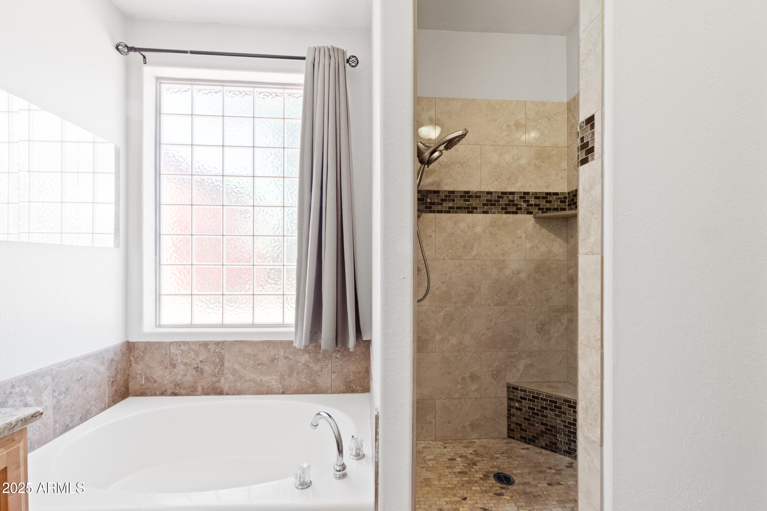 102 South Whiting Drive Payson, AZ 85541 - Photo 19 of 30 a bathroom with a tub and a shower