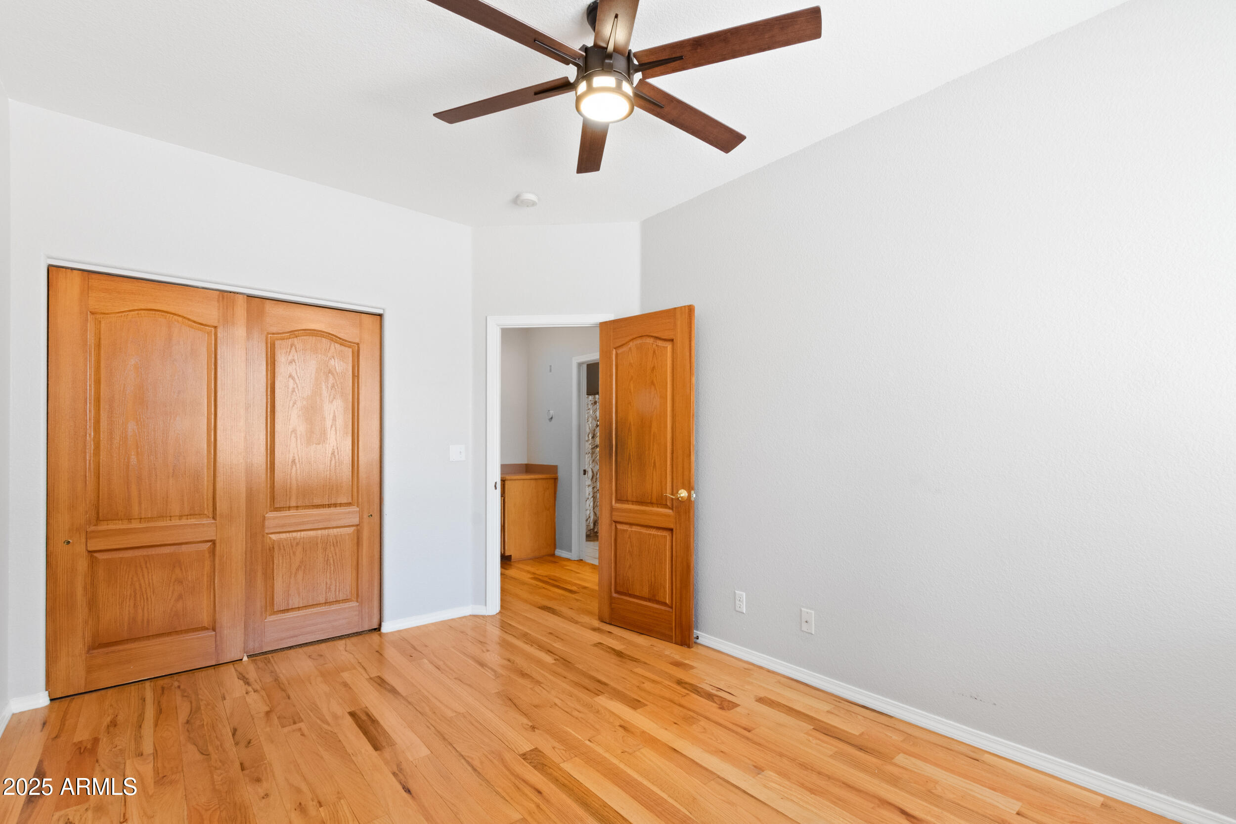 102 South Whiting Drive Payson, AZ 85541 - Photo 24 of 30 a view of empty room with wooden floor and fan