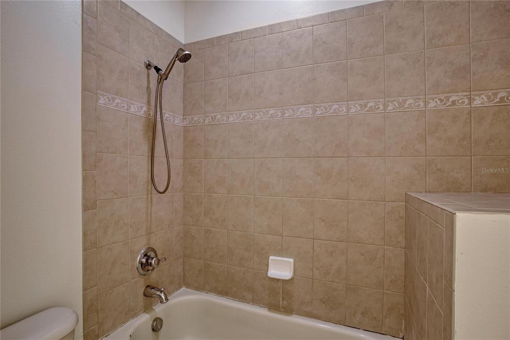 1344 Ribolla Drive Palm Harbor, FL 34683 - Photo 20 of 26 a bathroom with a shower
