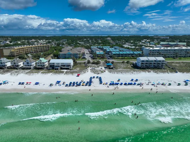 a view of a swimming pool with a lounge chair