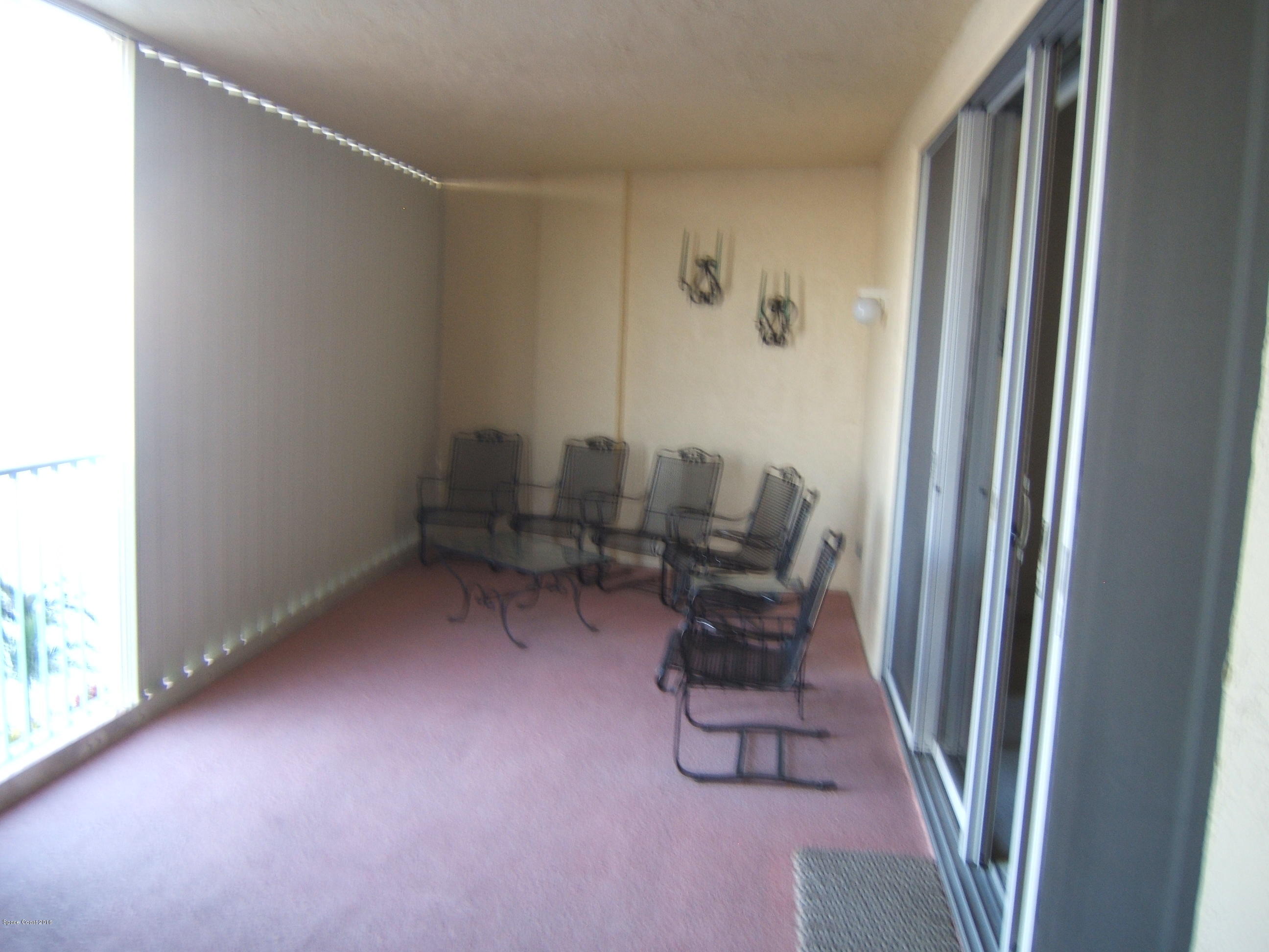 102 Riverside Drive, Unit 403 Cocoa, FL 32922 - Photo 28 of 33 Deep Porch with Hurricane Shutters
