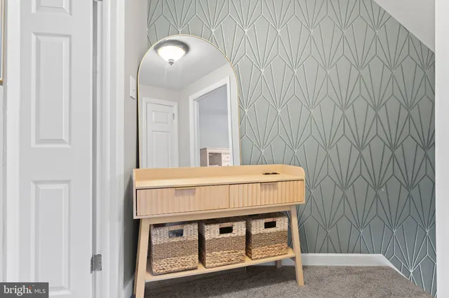 a spacious bedroom with a bed and a couch