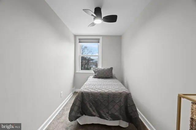 a room with gym equipment and a walk in closet