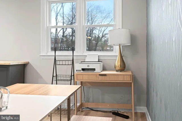 a room with a table and a window